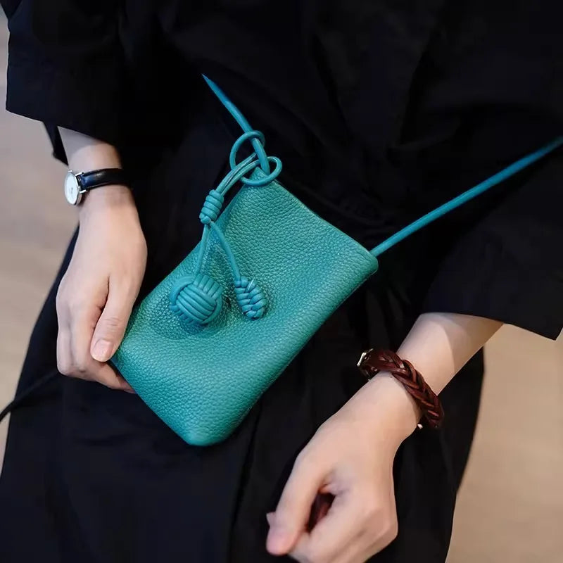Versatile artistic small fresh small round ball pendant crossbody phone bag, soft leather cute mini bag for women