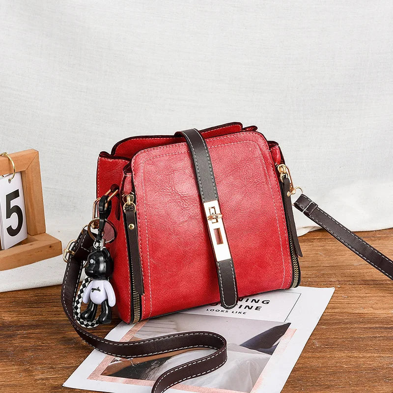 2026 New Fashionable Women's Bucket Bag Two tone Commuter Crossbody Bag ，with Pendant Student Handbag， Shoulder Bag。