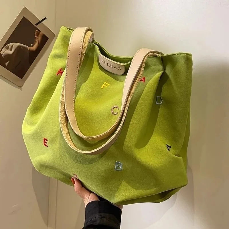 2025 New Canvas Bag Large Capacity Women's Trendy Embroidered Letter Tote Bag Small Fresh Student Shoulder Tote Bag