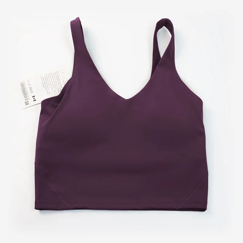 Women's yoga vest with U-shaped straps and built-in breast pads, offering a bare-skin feel suitable for fitness and exercise.