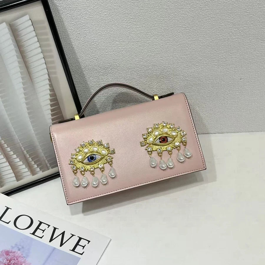New retro pearl diamond eye creative design shoulder messenger bag fashion women's light luxury Boston bag