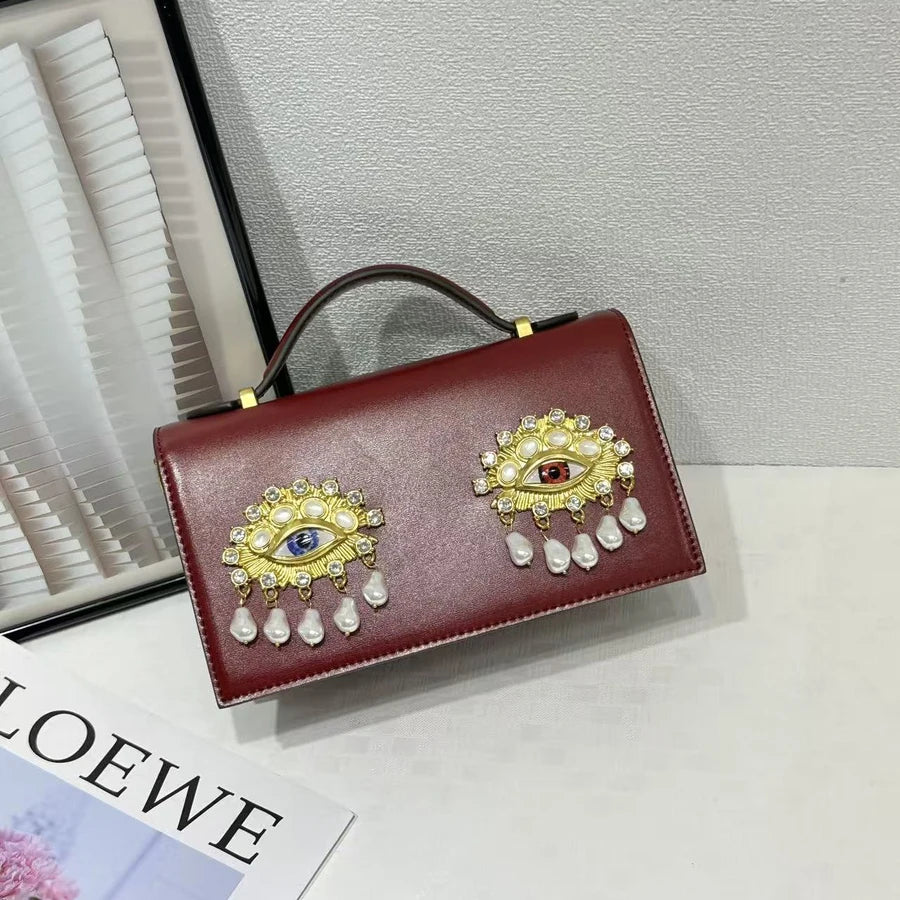 New retro pearl diamond eye creative design shoulder messenger bag fashion women's light luxury Boston bag