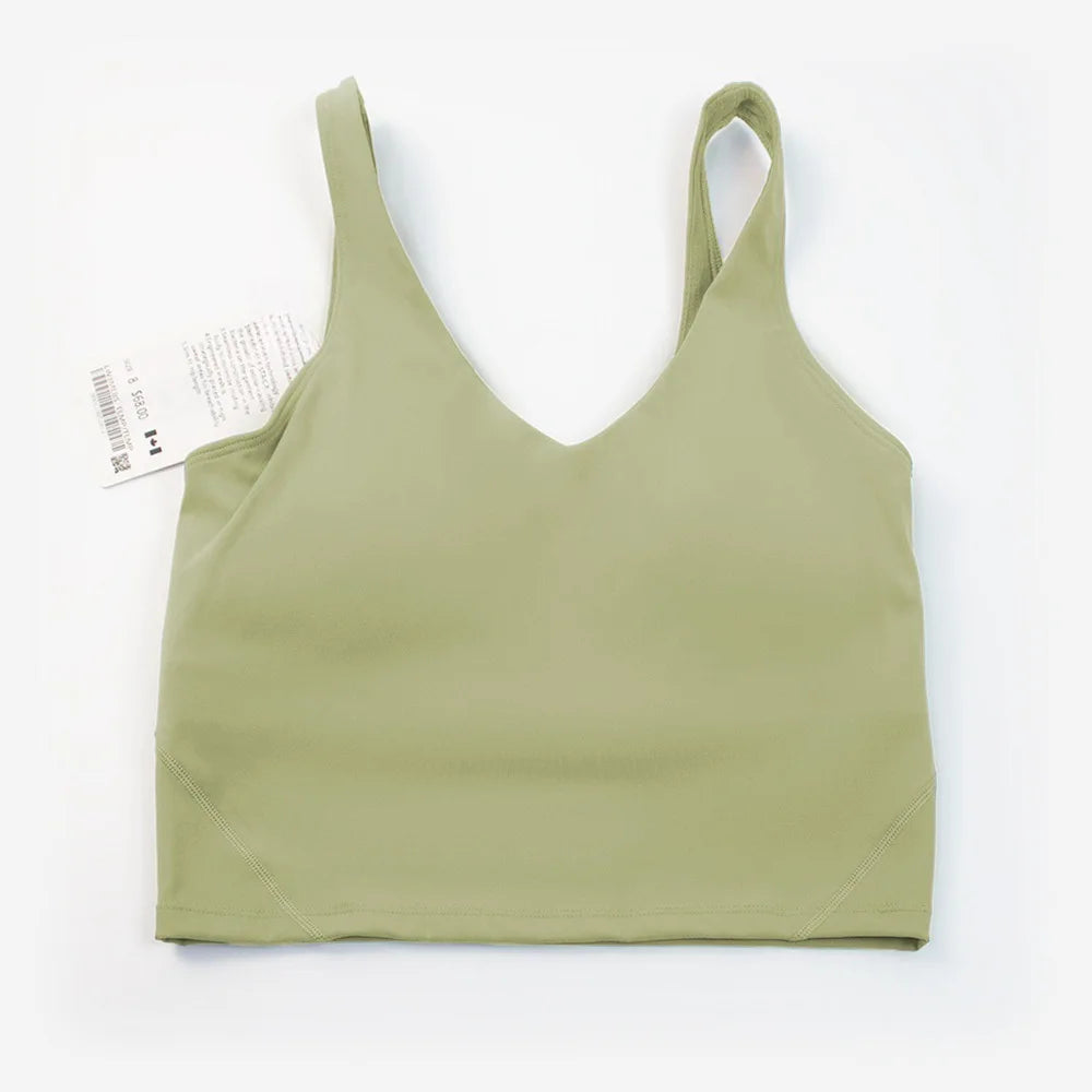 Women's yoga vest with U-shaped straps and built-in breast pads, offering a bare-skin feel suitable for fitness and exercise.