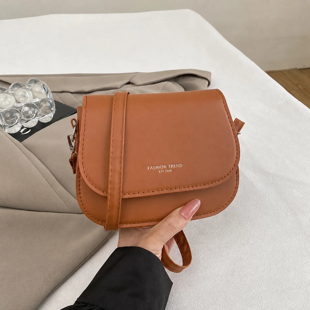 2026 New Fashion Saddle Shoulder Bag Women PU Leather Crossbody Bag Simple Solid Color Flap Messenger Bag Fashion Handbags Pouch