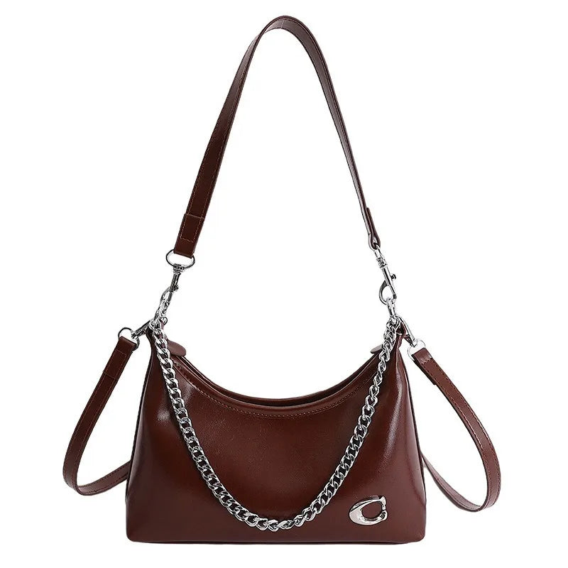 Retro and Simple Portable Jiaozi Bag Women's Spring 2026 New High-grade Textured Wild Shoulder Messenger Bag Gift for Girls.