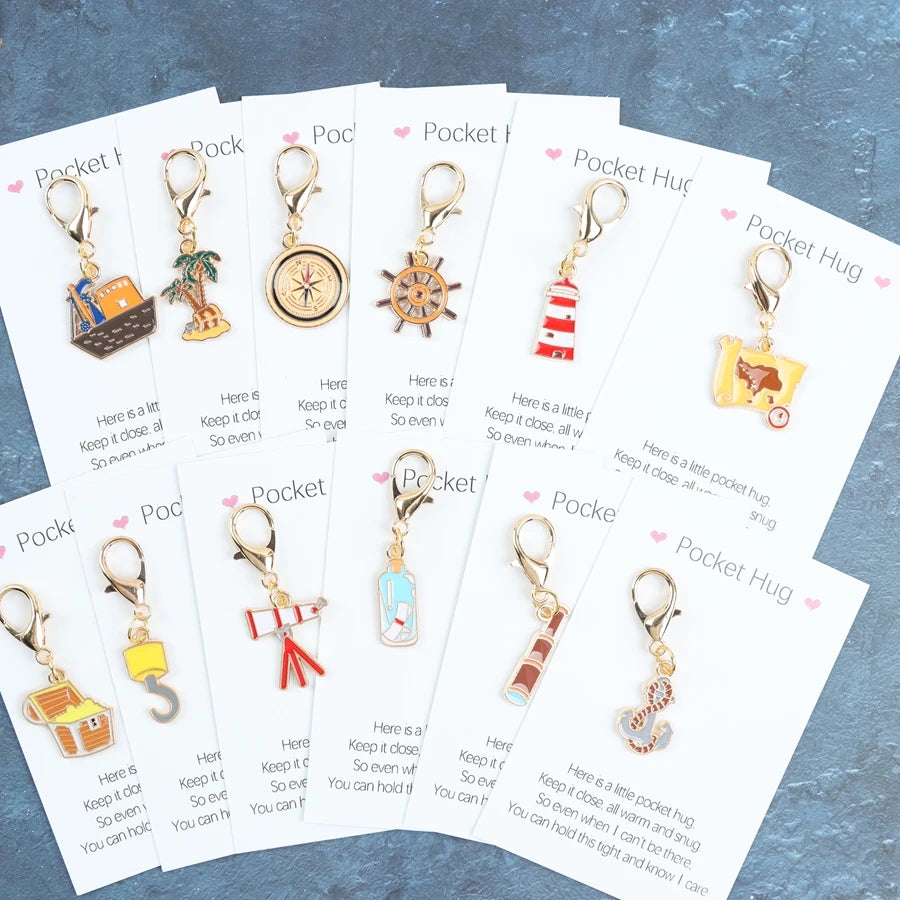 12pcs cartoon nautical treasure hunt keychain items, including a pocket-sized greeting card, with accessories such as ropes, map