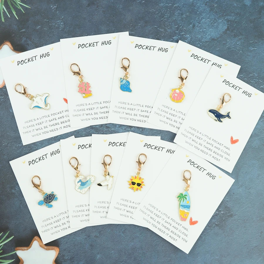 10 sea-themed keychain items featuring marine elements such as sea turtles, seagulls, whales, and shells. Includes a pocket-size
