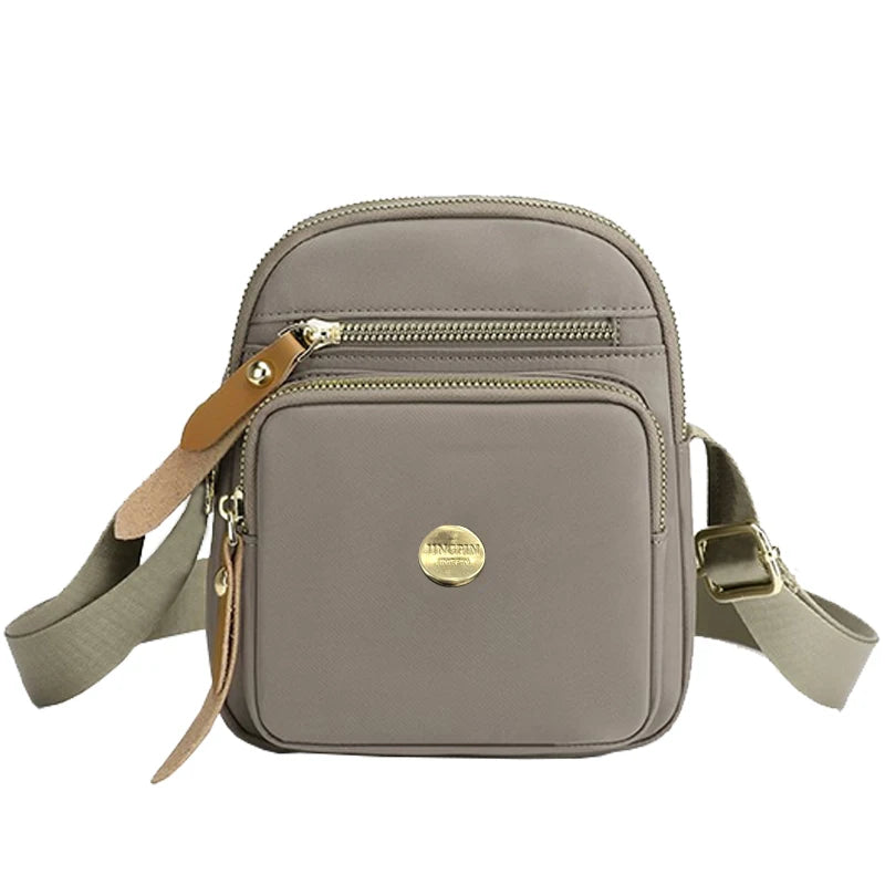 Neutral style compact mini bags for men and women, designed for travel and outings, featuring a simple single-shoulder design.