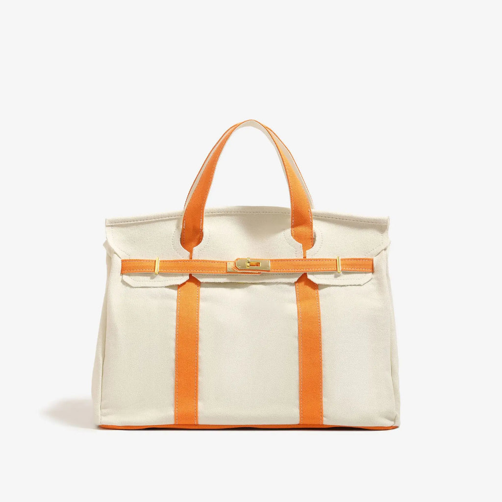 Canvas bag for women 2026 new high-end and niche design, contrasting color handbag, large capacity commuting versatile bag