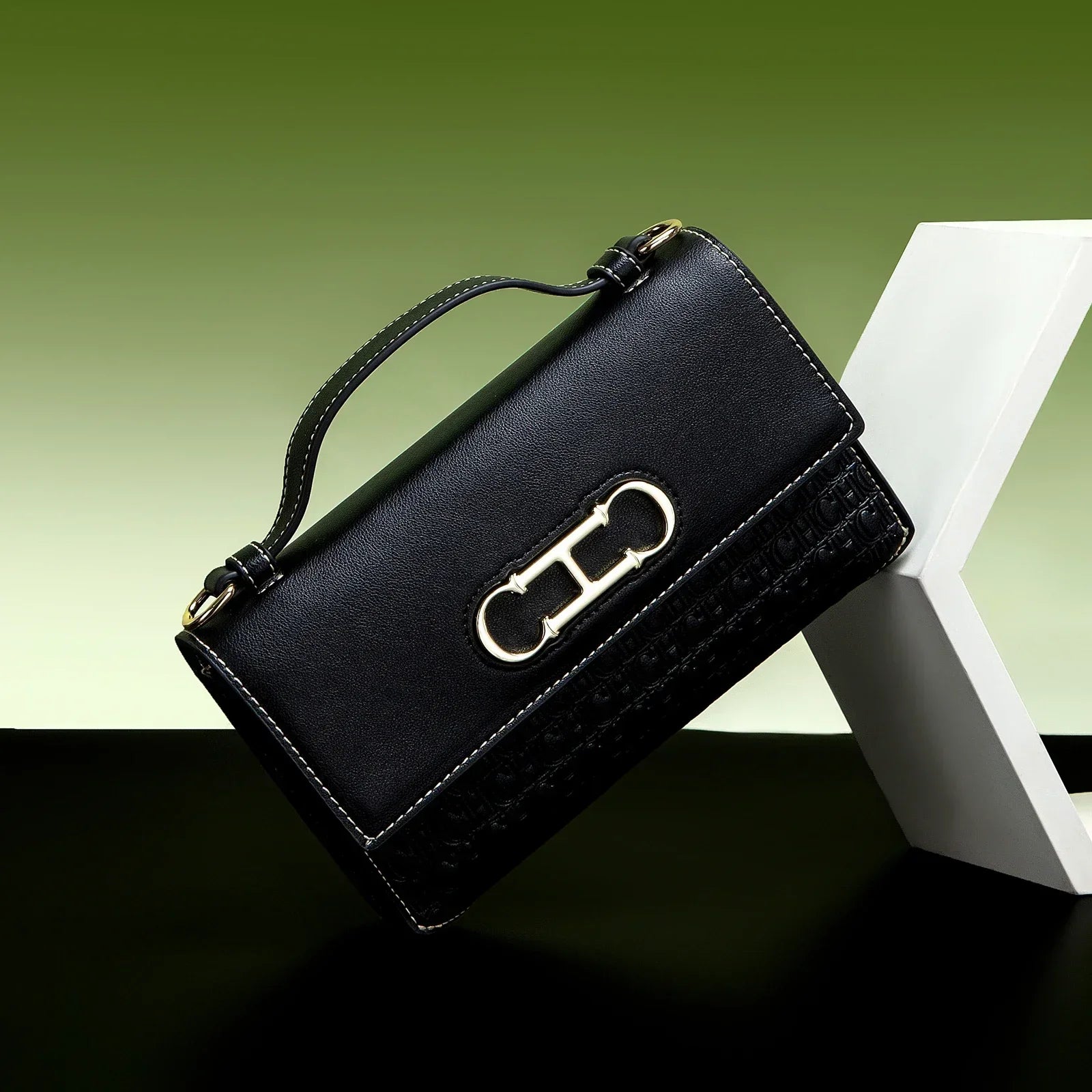 CH Premium Leather Handbag Monogram Embossing Metallic Clasp Portable Handle Structured Silhouette Ideal Office Evening Events