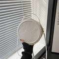 Solid color hand-held small round bag 2025 new bag, women's fashion shoulder bag, casual personalized crossbody bag
