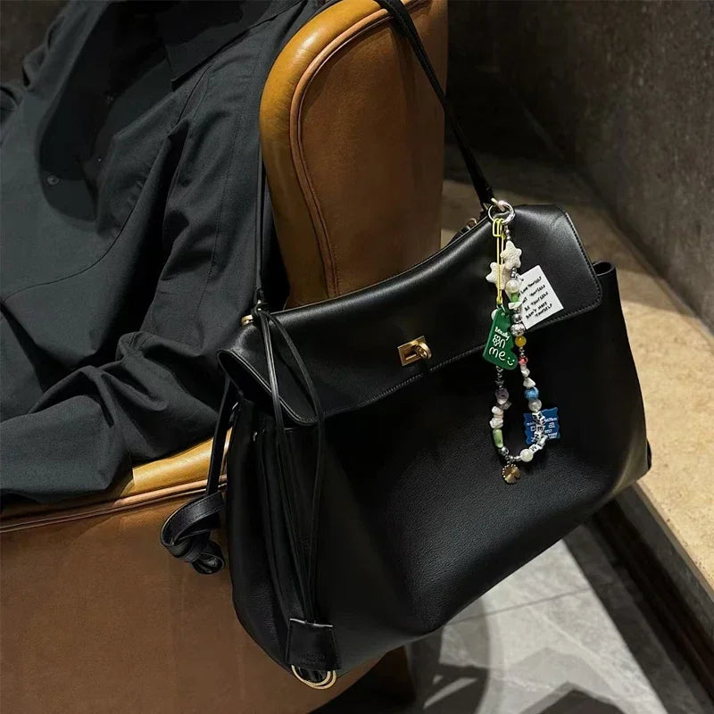 New Women's Large Capacity Leather Rodeo Bag Fashion Advanced Lock Design High Sense Underarm Shoulder Bag