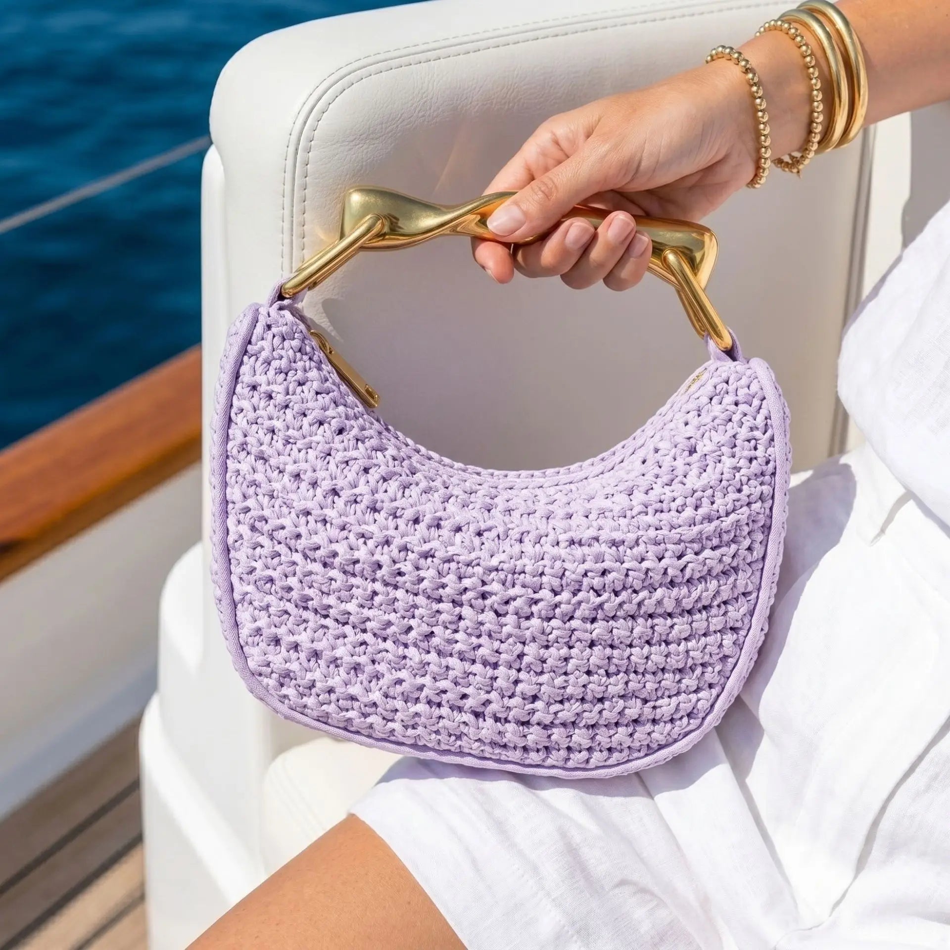 Casual vacation seaside woven straw fashion versatile metal pillow bag Boston clutch messenger bag