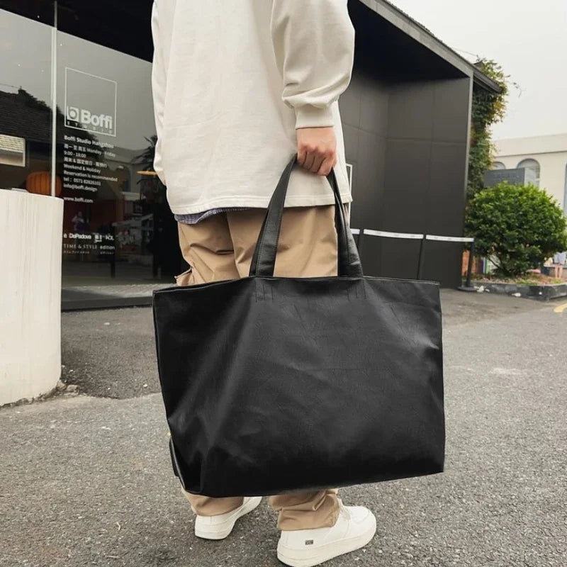 New PU Black Zipper Large Capacity Handbag Lightweight Soft Leather Shoulder Bag Unisex Simple Fashionable Versatile Tote Bags