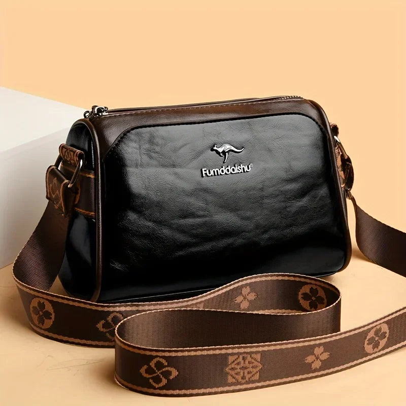 Vintage White Black Crossbody Bag with Retro Brown Monogram Strap Spacious Versatile Stylish for City Strolls and Casual Outings