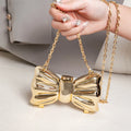 Metallic Gold 3D Bow Shaped Mini Hard Case Crossbody Bag, Glossy Mirror Surface Metal Clutch with Detachable Oval Link Chain Strap, Cute Luxury Evening Micro Handbag for Lipstick Small Accessories