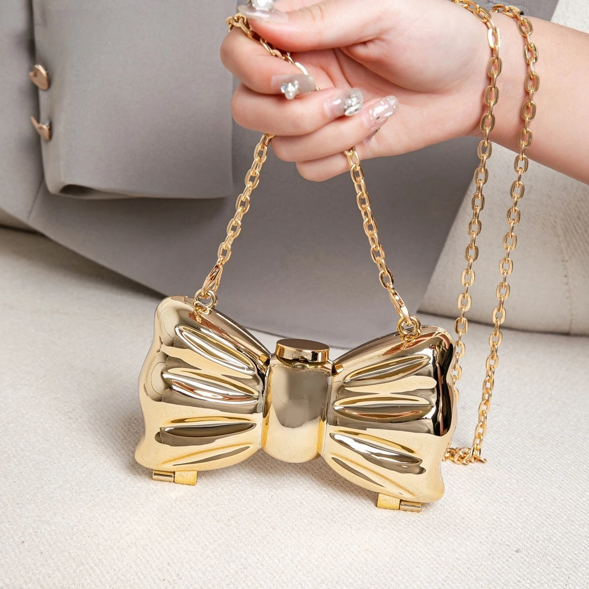 Metallic Gold 3D Bow Shaped Mini Hard Case Crossbody Bag, Glossy Mirror Surface Metal Clutch with Detachable Oval Link Chain Strap, Cute Luxury Evening Micro Handbag for Lipstick Small Accessories