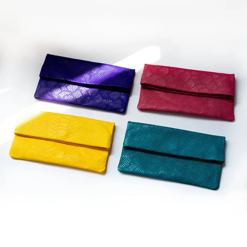 Sheepskin Snakeskin grain clutch bag Women's soft leather clutch  Mobile phone bag Large capacity envelope casual wholesale