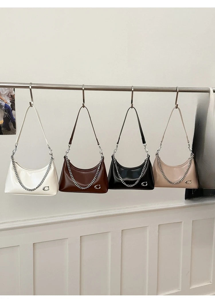 Retro and Simple Portable Jiaozi Bag Women's Spring 2026 New High-grade Textured Wild Shoulder Messenger Bag Gift for Girls.
