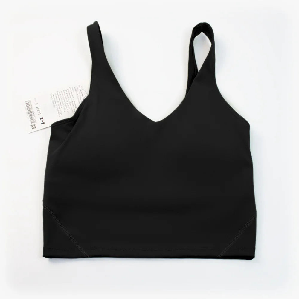 Women's yoga vest with U-shaped straps and built-in breast pads, offering a bare-skin feel suitable for fitness and exercise.