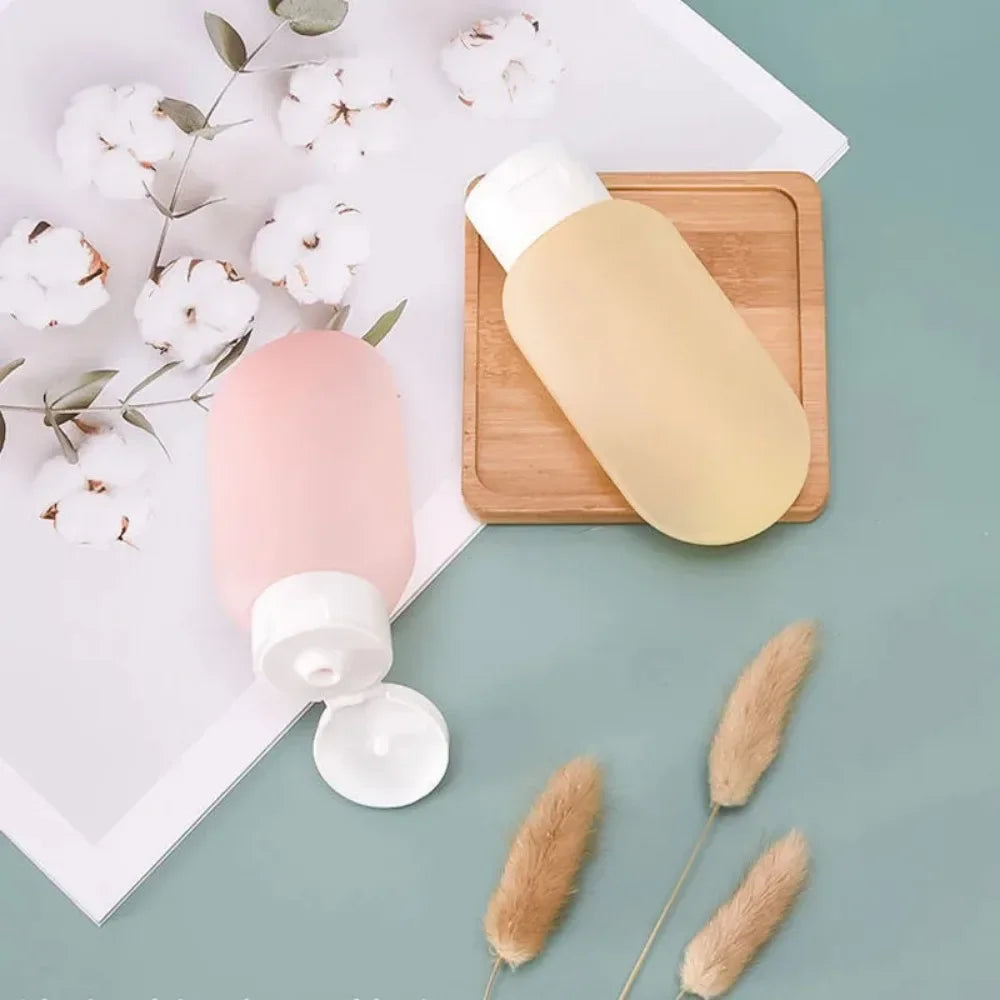 4Pcs/Set 60ml Refillable SqueezeBottles Empty Leakproof Portable Travel Containers For Shampoo Lotion Skincare Travel Essentials