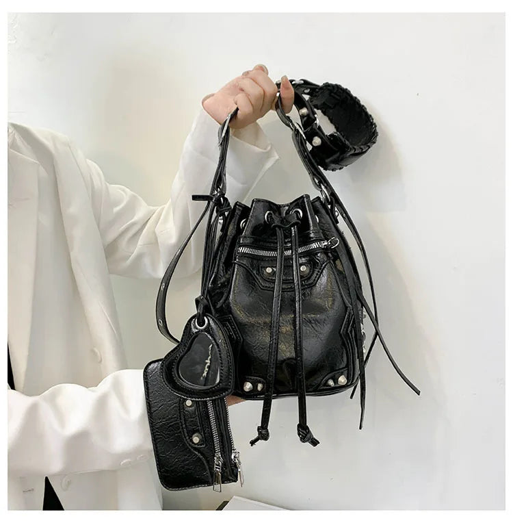 2025 Crossbody bag female new heavy industry locomotive wind rivet tide pump with bucket bag fashionable shoulder bag