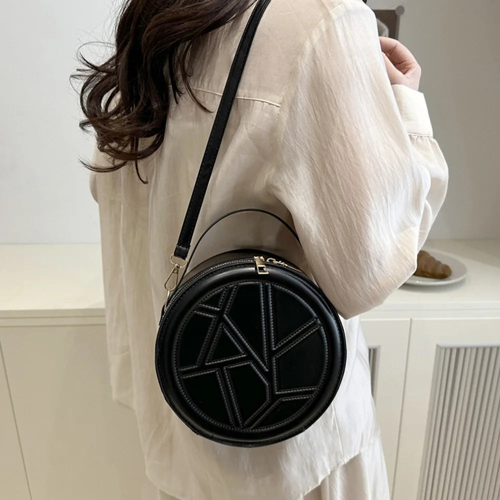 Solid color hand-held small round bag 2025 new bag, women's fashion shoulder bag, casual personalized crossbody bag