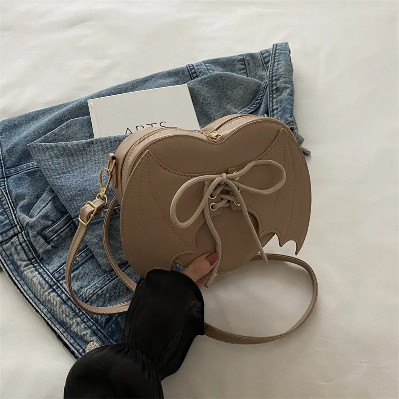 Korean-style Ins fashionable cute girl's bag 2026 new style simple small square bag personalized batwing shoulder messenger bag