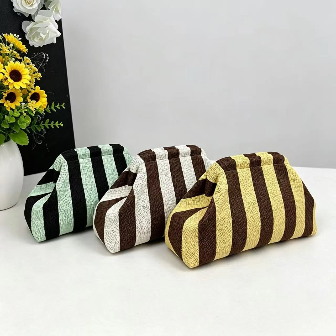 New bright-colored knit bag, thin striped fly-knit cloud, versatile elegant portable makeup bag, large-capacity handbag