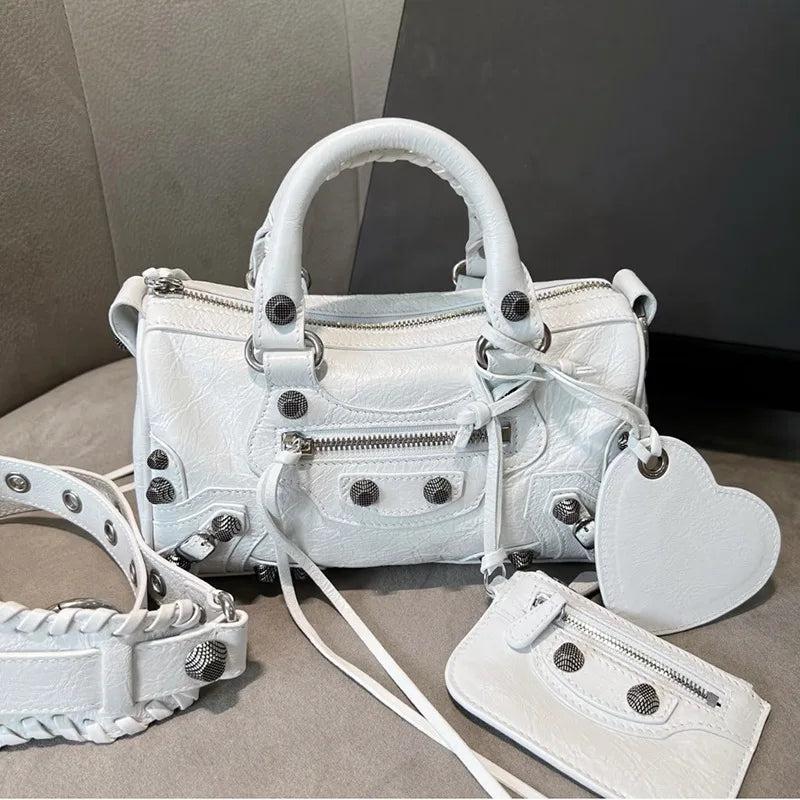 2026 New Mini Cylinder Motorcycle Bag Women's Rivet Tassel Three-in-One Pleated Cowhide Single Shoulder Slant Cross Handbag