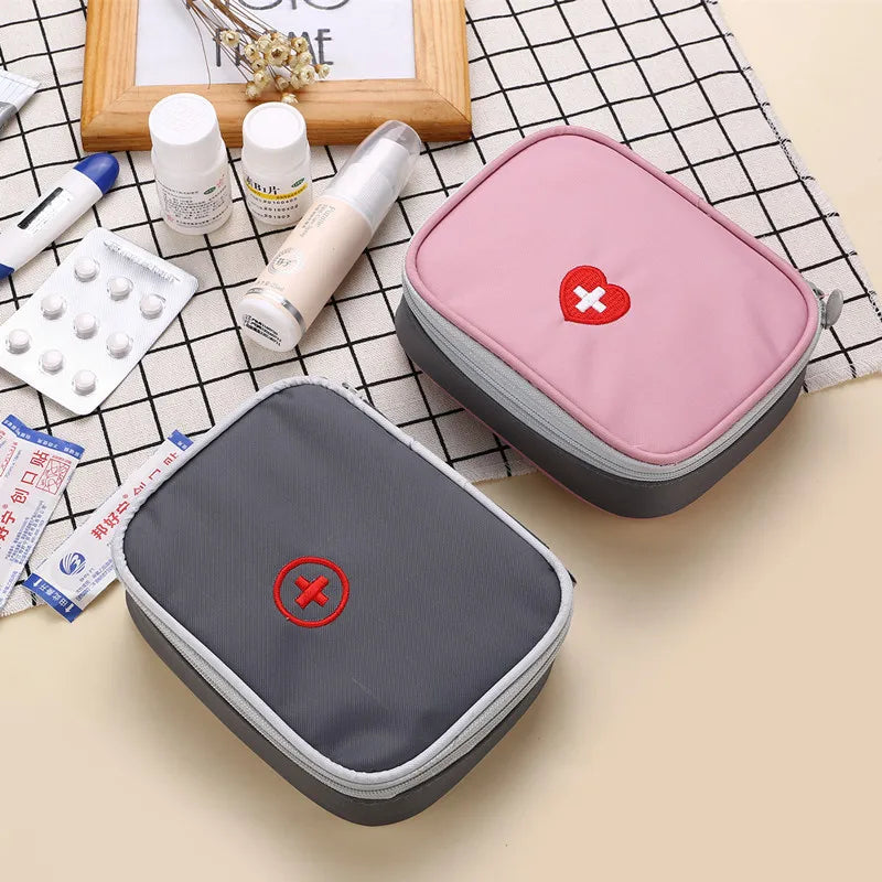 Mini Home First Aid Kit Multi-functional Storage Bag Portable Tablet Storage Large Capacity and Multiple Compartments