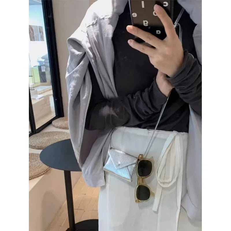 Compact and exquisite coin purse 2024 New mini crossbody bag, waist bag, neck-hanging small bag, card holder, pendant bag