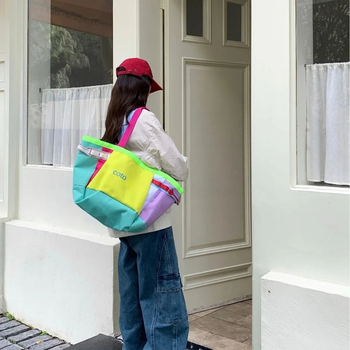 30L rainbow-colored patchwork nylon tote bag, large capacity with multiple side pockets, lightweight shoulder bag, suitable for shopping, travel, and daily outdoor activities.