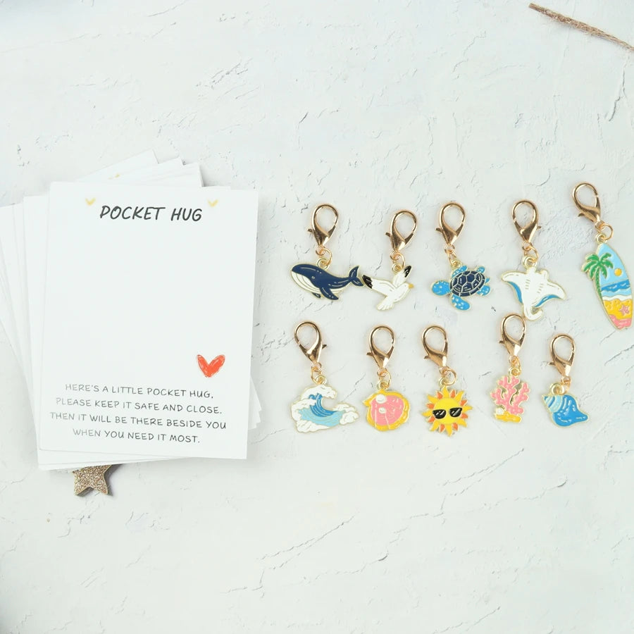 10 sea-themed keychain items featuring marine elements such as sea turtles, seagulls, whales, and shells. Includes a pocket-size