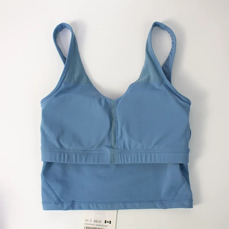 Women's yoga vest with U-shaped straps and built-in breast pads, offering a bare-skin feel suitable for fitness and exercise.