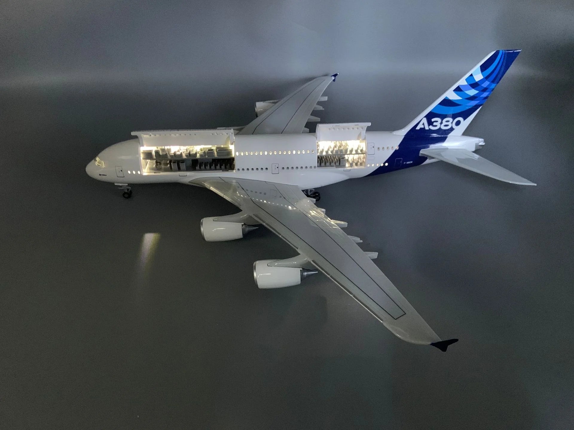 1:160 Scale Model Plane A380 Prototype with Opening Doors LED Lights & Rolling Landing Gear Static Display Souvenir Plane Toy