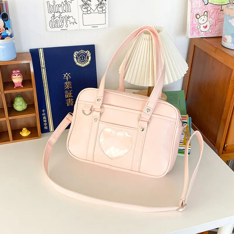 PU leather JK uniform single-shoulder heart large-capacity waterproof commuter crossbody bag for girls