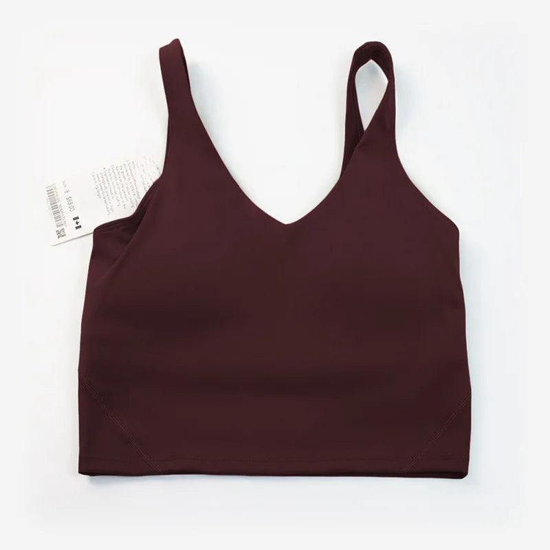 Women's yoga vest with U-shaped straps and built-in breast pads, offering a bare-skin feel suitable for fitness and exercise.