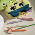 Tamagotchi multifunctional pencil case, student stationery organizer, portable makeup bag, cute, practical, and good-looking