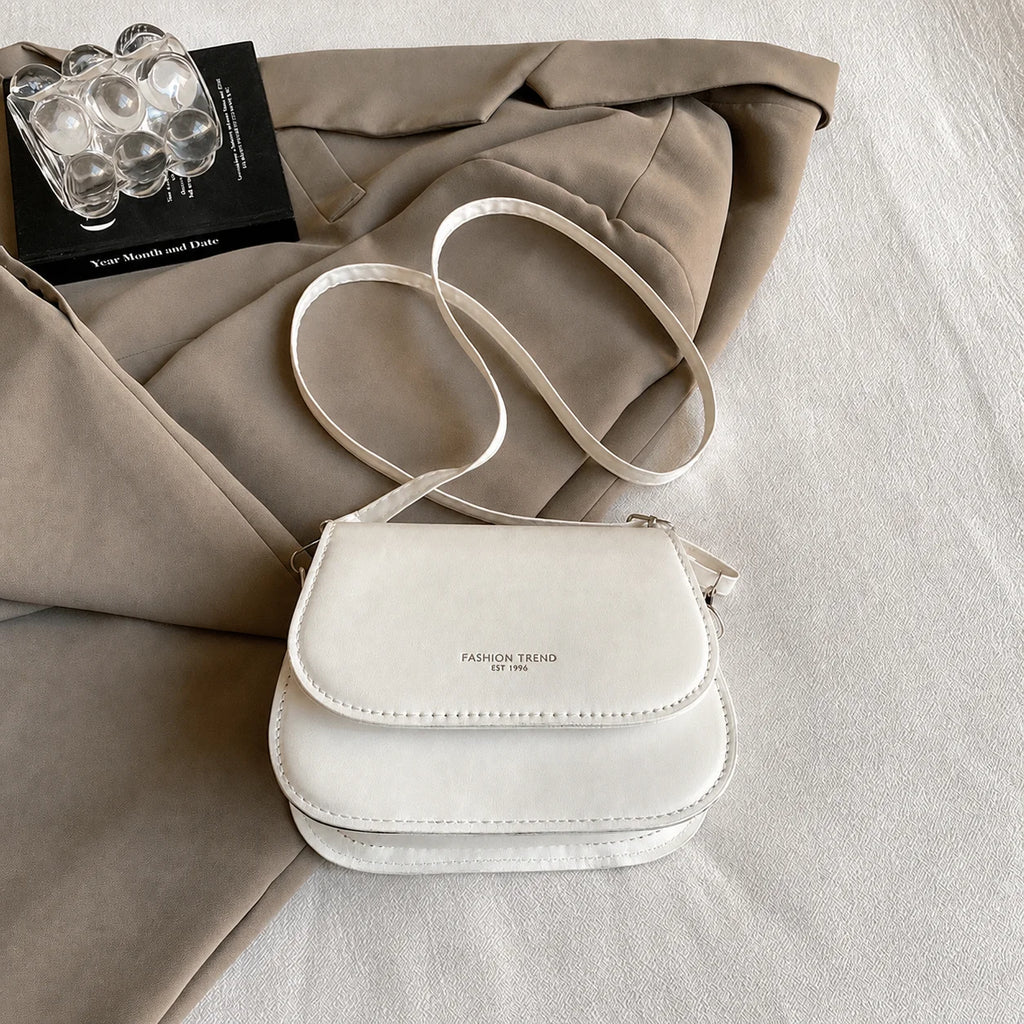 2026 New Fashion Saddle Shoulder Bag Women PU Leather Crossbody Bag Simple Solid Color Flap Messenger Bag Fashion Handbags Pouch