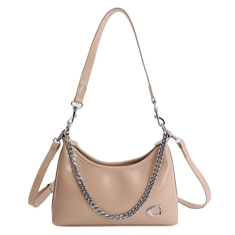 Retro and Simple Portable Jiaozi Bag Women's Spring 2026 New High-grade Textured Wild Shoulder Messenger Bag Gift for Girls.