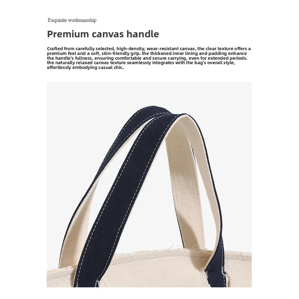 Canvas bag for women 2026 new high-end and niche design, contrasting color handbag, large capacity commuting versatile bag