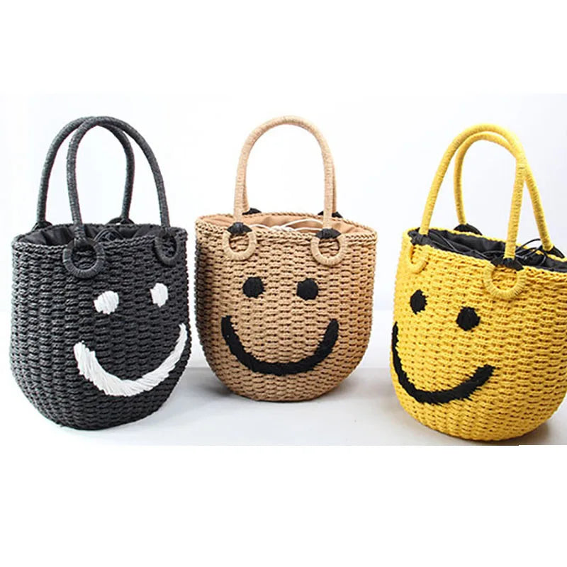 2025 Summer New Smile Face Bucket Straw Woven Handbag Kawaii Small Beach Bag City Simple Style Double Strap Drawstring Closure