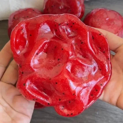 A soft toy in the style of watermelon sauce, with a slow shape recovery and realistic fruit, suitable for making gifts.