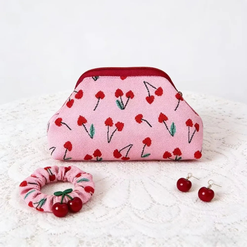 New women's cherry embroidery printed handbag, fashionable and convenient fly-knitted bag, versatile commuter cloud bag.