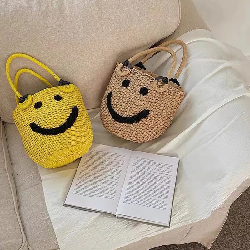 2025 Summer New Smile Face Bucket Straw Woven Handbag Kawaii Small Beach Bag City Simple Style Double Strap Drawstring Closure