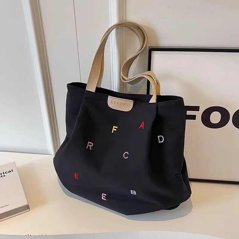 2025 New Canvas Bag Large Capacity Women's Trendy Embroidered Letter Tote Bag Small Fresh Student Shoulder Tote Bag